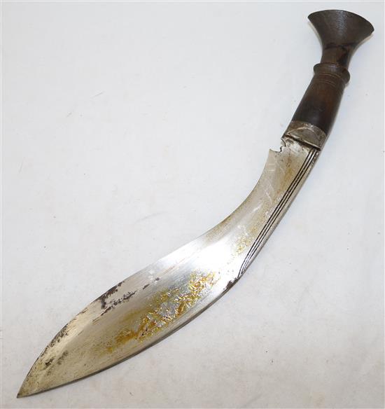 A kukri with silver mounted scabbard, overall 14in.